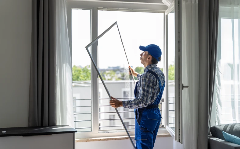 Contractors applying insulated vinyl siding in Fort Smith, AR.
