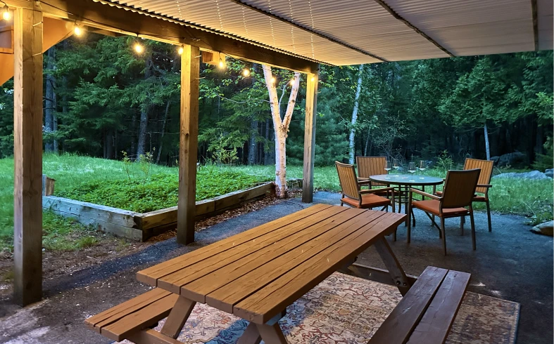 Evening patio scene in a forest setting