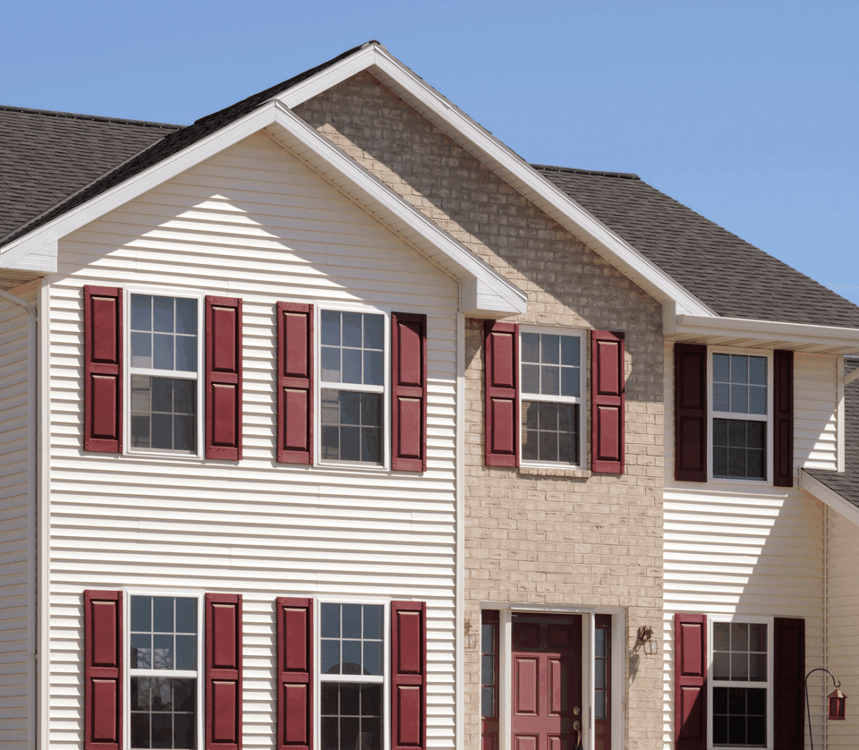 Suburban house with red shutters